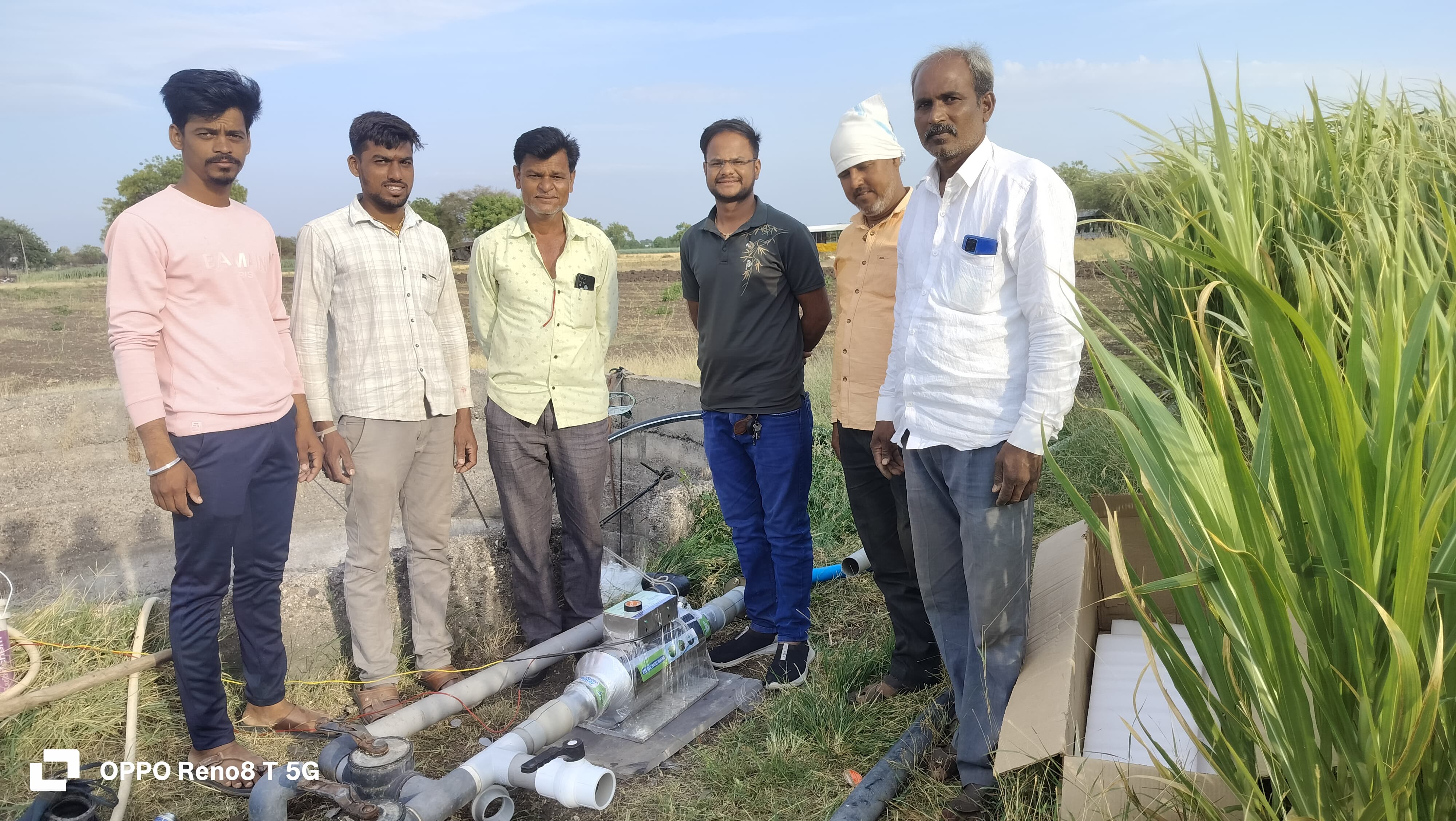 Technical demonstration of water conditioning device in sugarcane farming area with team